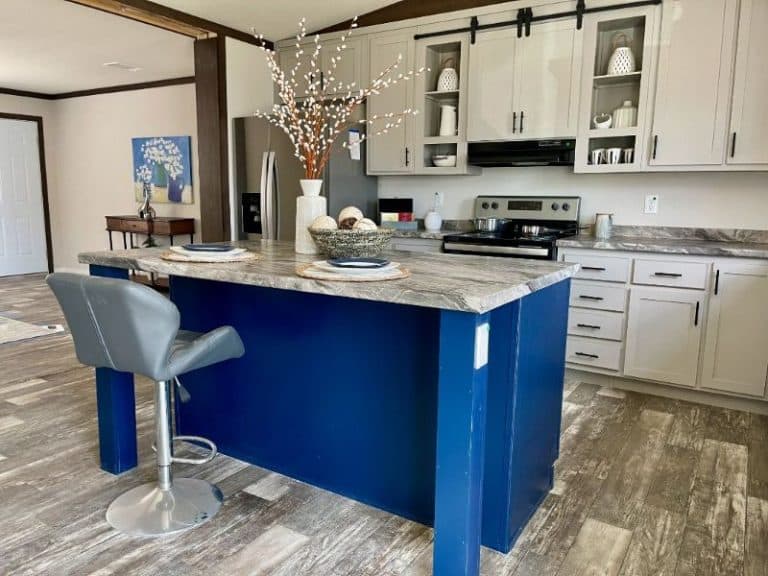 kitchen with a center island with a blue counter top