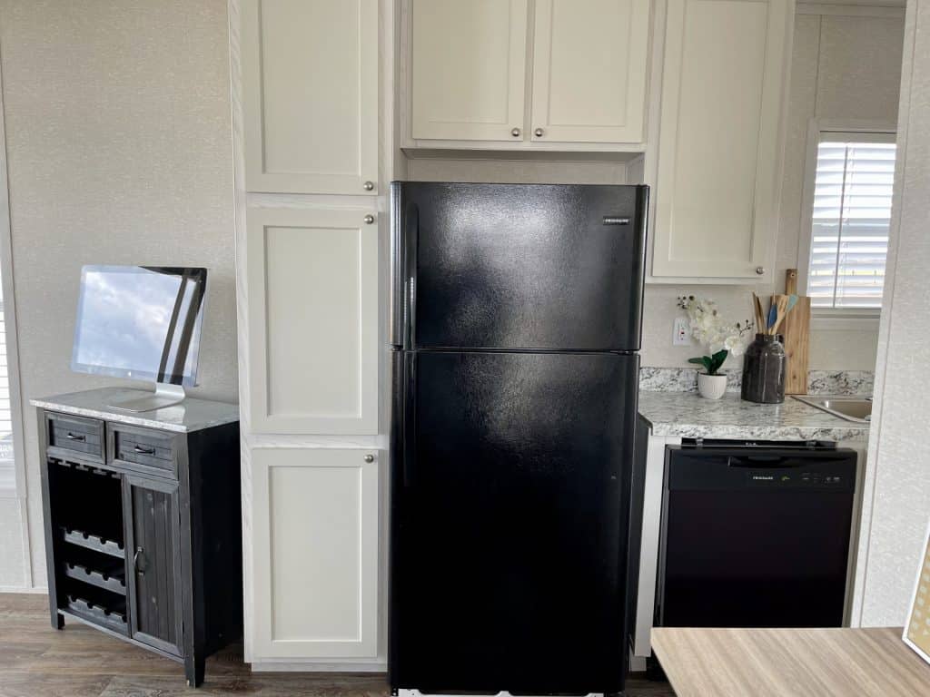 black refrigerator at kitchen