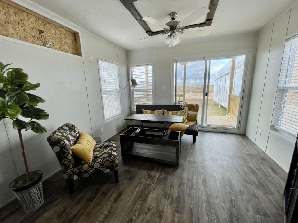 tiny mobile home dining room with attached living room